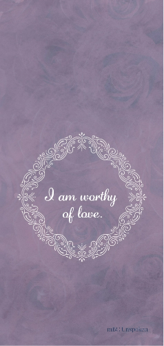 The phrase, “I am worthy of love,” sits inside of a white, ornate diamond on a lavender background.